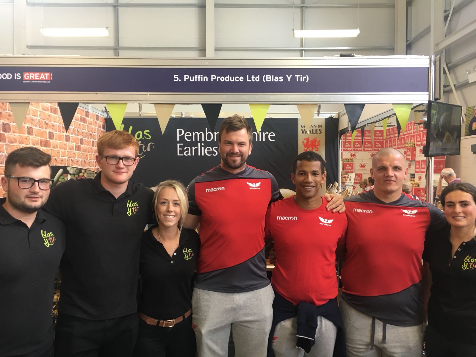 Scarlets Rugby Team visiting the Blas y Tir stand at the Royal Welsh Show 2018